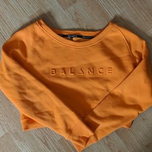 Balance Athletica orange crop sweater